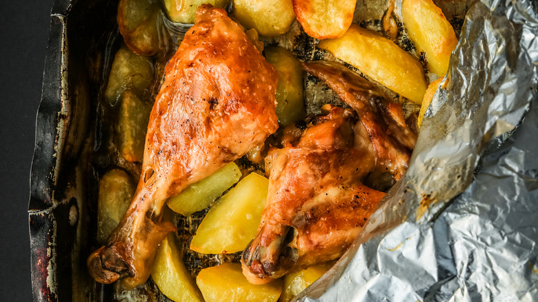 chicken drumstick under aluminum foil