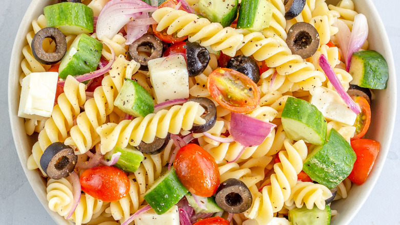 A bowl of pasta salad