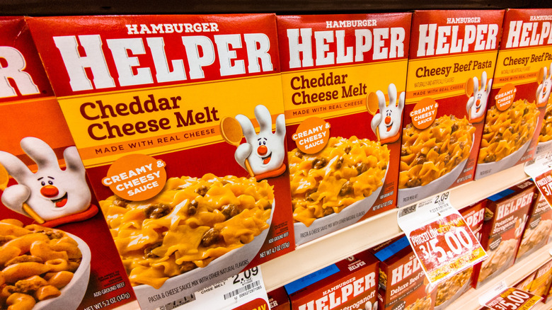Boxes of Hamburger Helper on grocery store shelves
