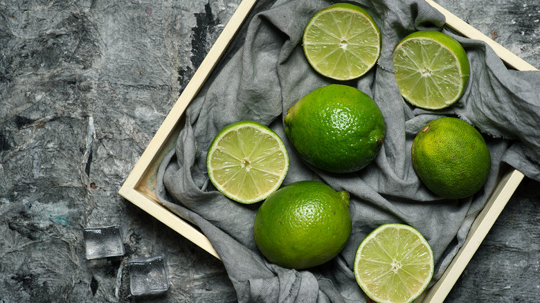 Cut limes on gray cloth