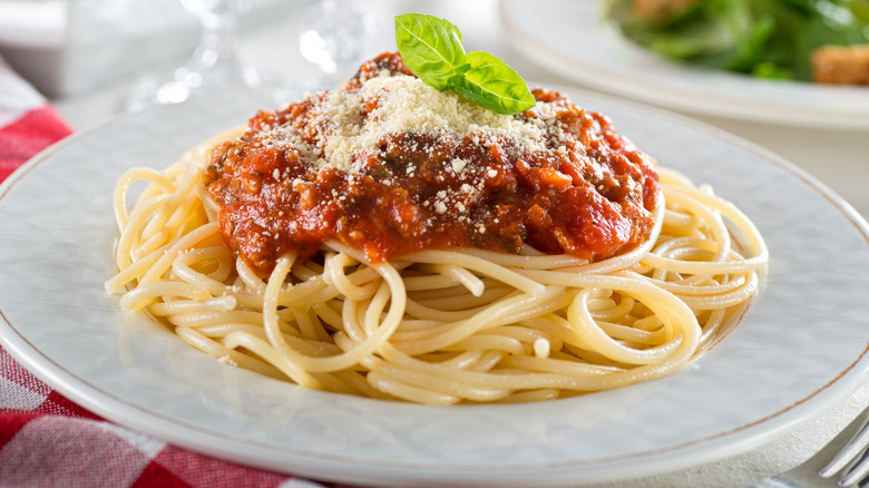 A plate of spaghetti with bolognese 