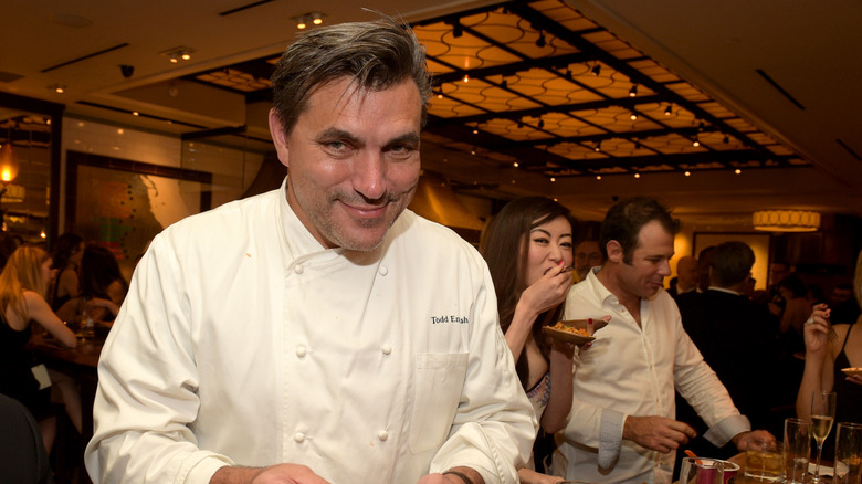 Chef Todd English smiles for a photo while at a party