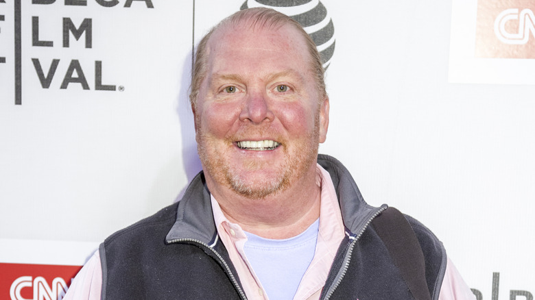 Chef Mario Batali poses at a red carpet event