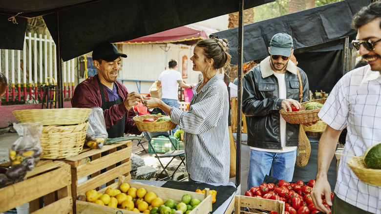 People shopping for produce at a farmers' market
