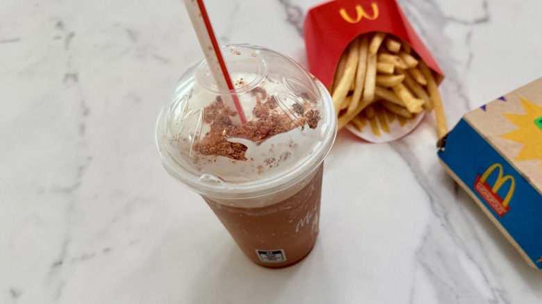 Chips Ahoy! Frappé with fries and sandwich package in background