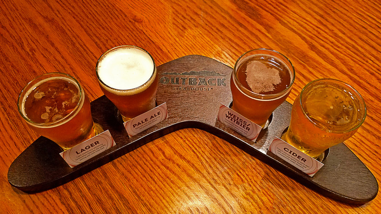 Outback Steakhouse beer flight on a boomarang