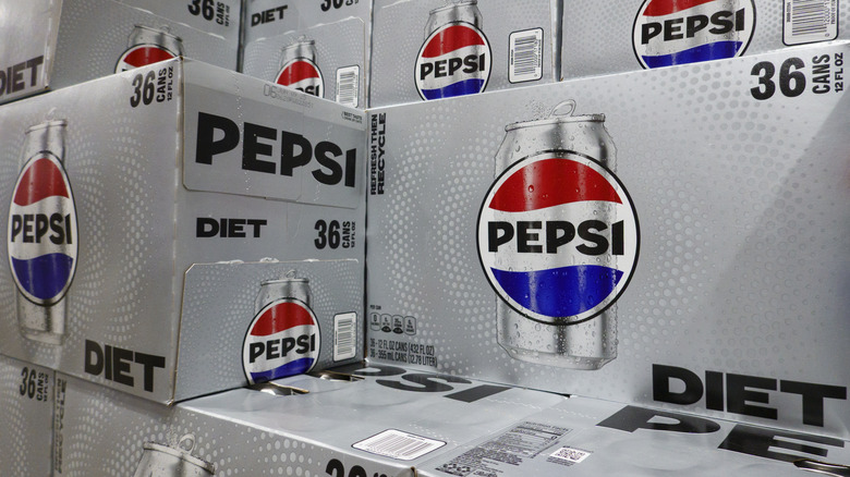 Cases of Diet Pepsi on shelves.
