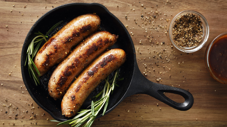 Sausages with some rosemary.