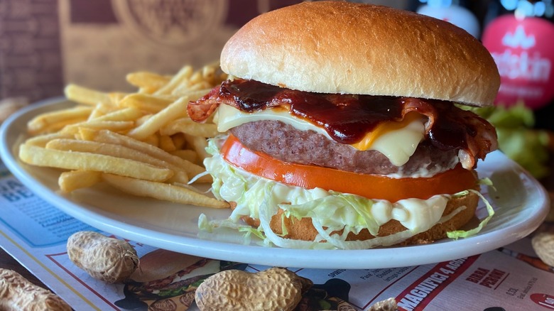 Old Wild West bbq burger with fries and peanuts