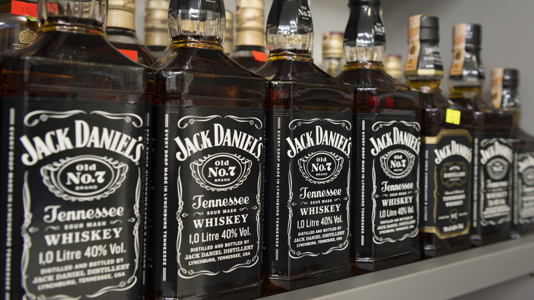 Jack Daniel bottles sold on shelf.