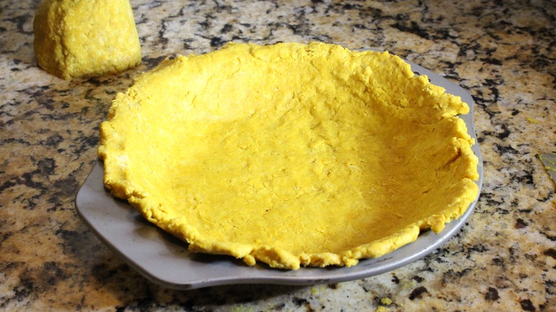 pie tin with bottom crust
