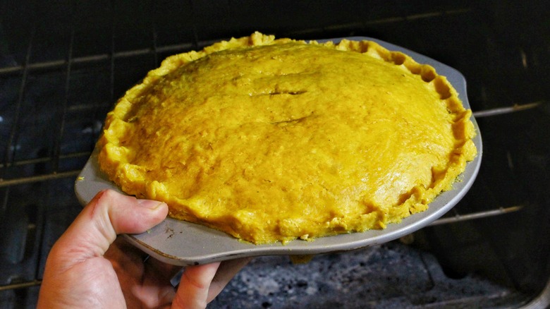 pie going into oven