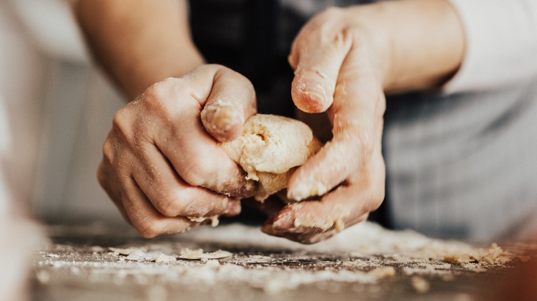 Person kneading dough