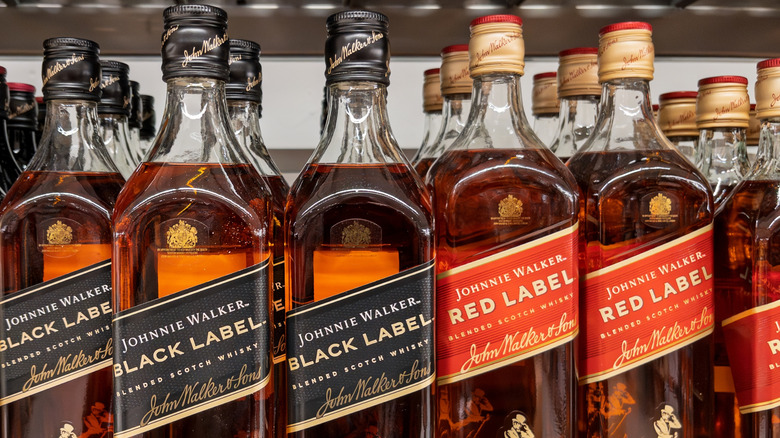 Johnnie Walker Red and Black Label bottles.