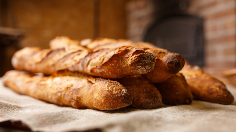 several baguettes on table