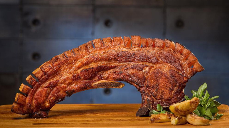 fried kan kan on cutting board with garnish