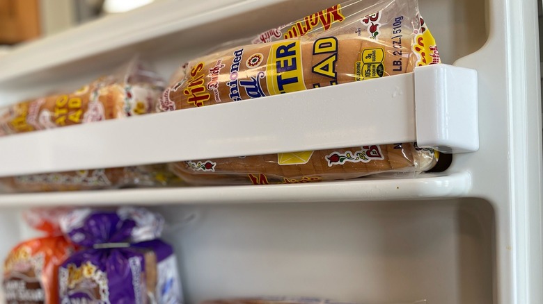Loaves of Martin's Famous potato bread sit inside a freezer door shelf.