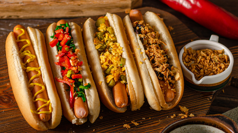 hot dogs on a wooden board