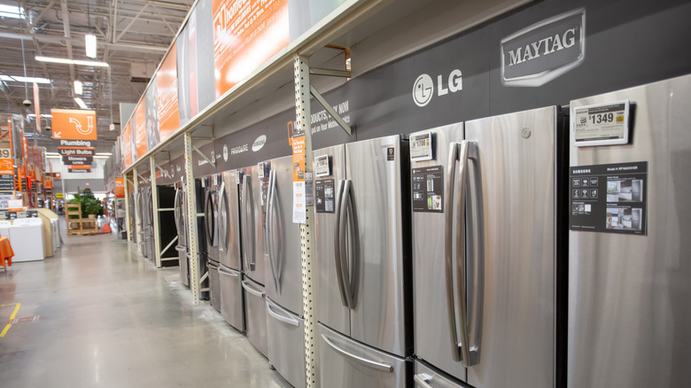 A Maytag refrigerator among other brands in Home Depot