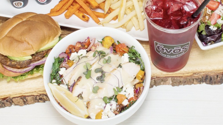 EVOS Feel Great Food Salad, burger, and drink