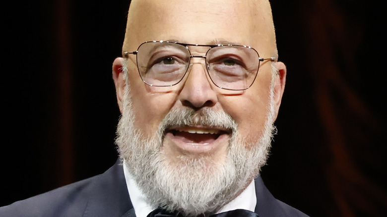 Andrew Zimmern on stage at 2023 James Beard Awards in Chicago