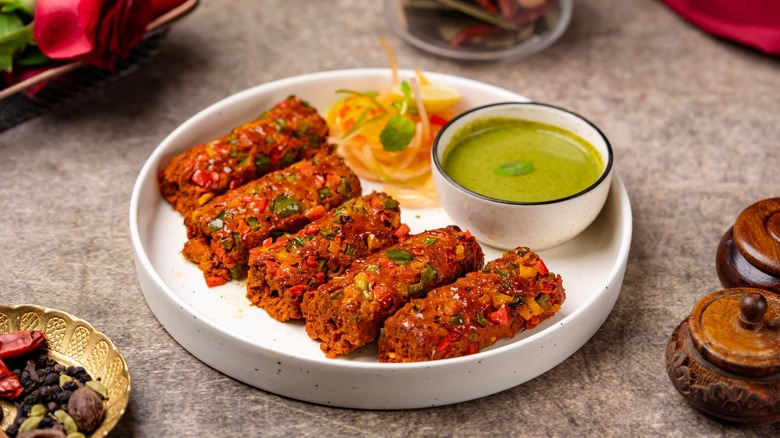 Mutton kebabs wth a green sipping sauce