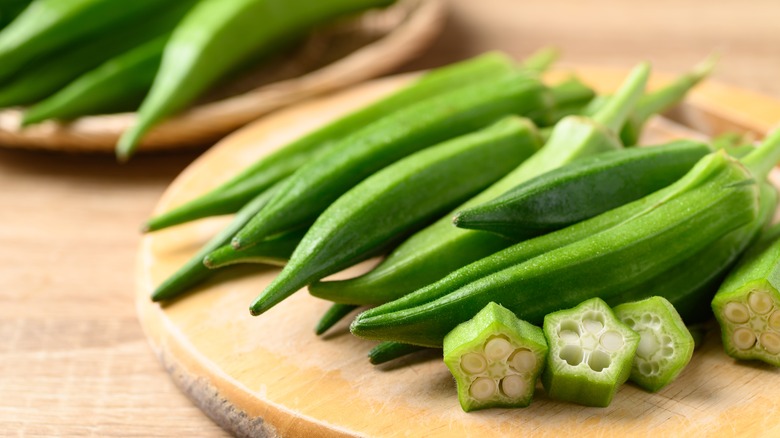 Okra on a wooden board