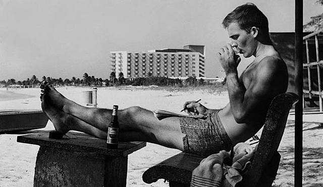 Hunter S. Thompson enjoying a drink (or two) in Puerto Rico in the mid-1960s.