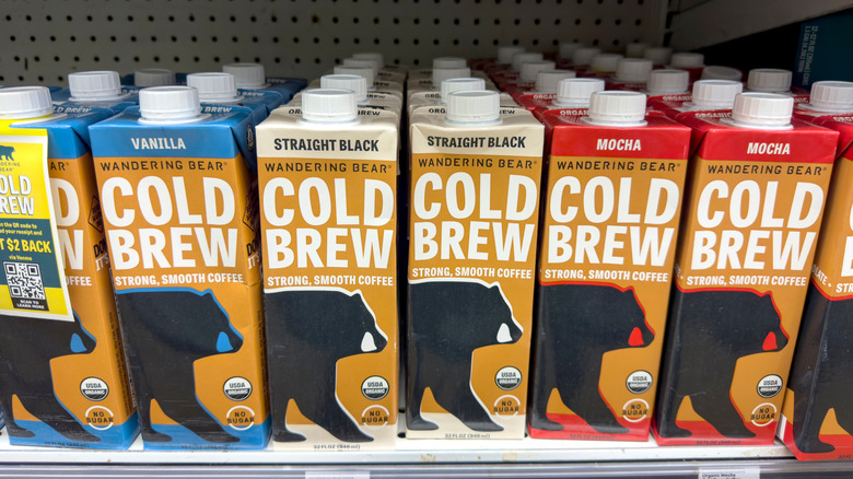 Rows of Wandering Bear cold brew coffee sits on a grocery store's shelf
