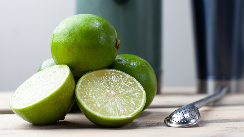 Limes whole and halved