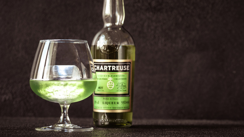 Chartreuse liqueur bottle and drink.