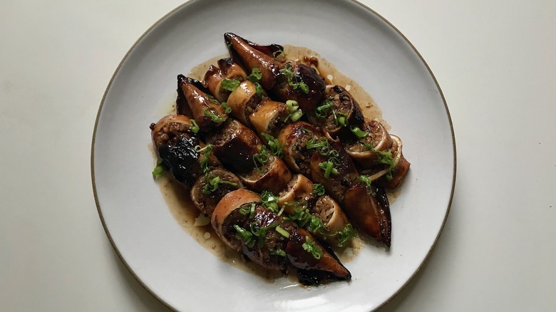 sliced stuffed squid on plate
