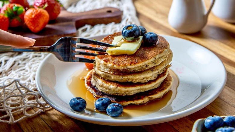Long Table stack of pancakes with fruit