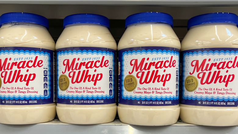 Miracle Whip jars on a store shelf.