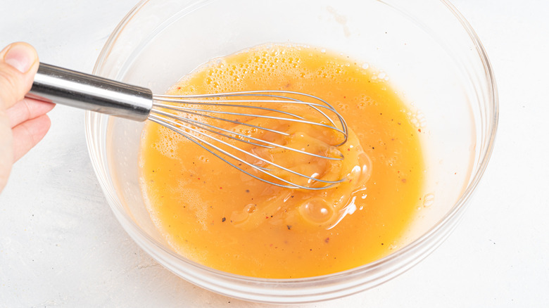 Whisking eggs with a whisk
