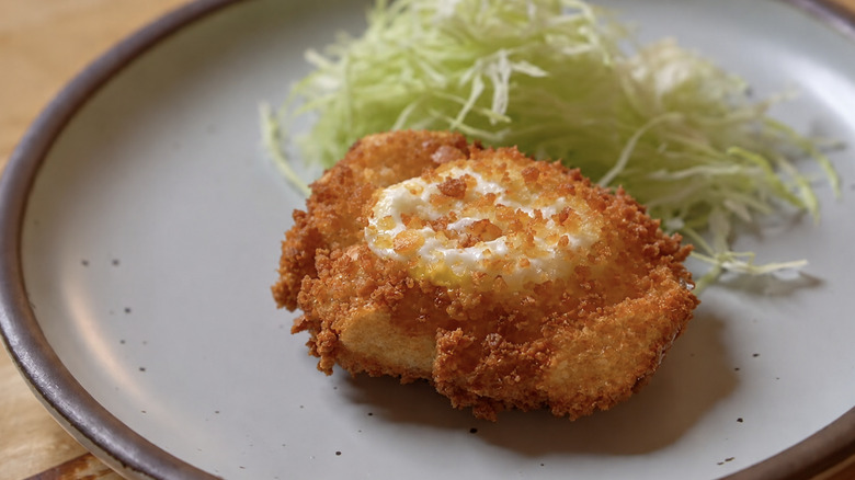 A katsu egg with cabbage.