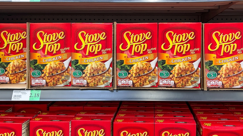 Rows of Stove Top Chicken Stuffing mix on a store shelf