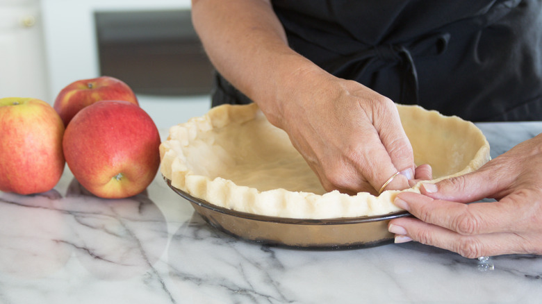 baker crimping pie crust