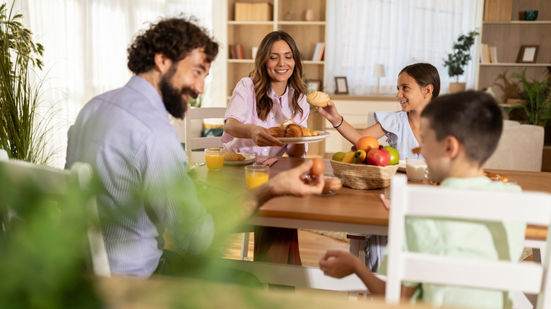 family eating in dining room