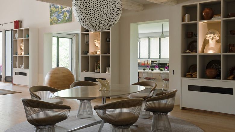 dining room pictured with oversized chairs