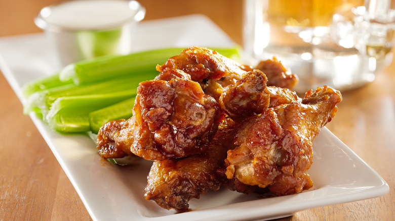 Barbecue wings with celery and ranch dressing