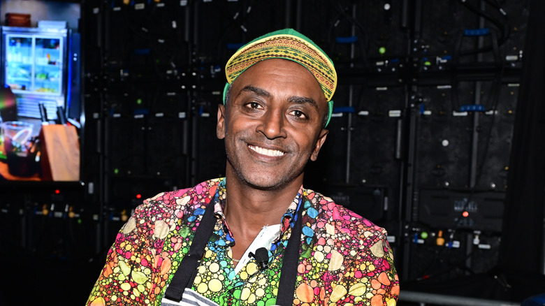 Marcus Samuelsson with magenta hat