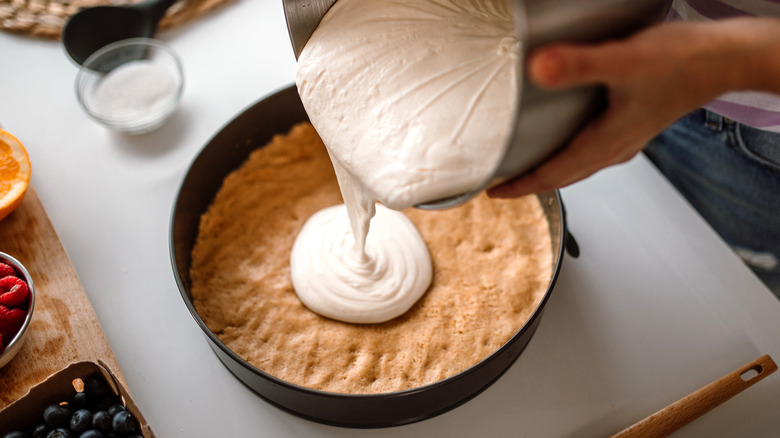 Home cook making cheesecake