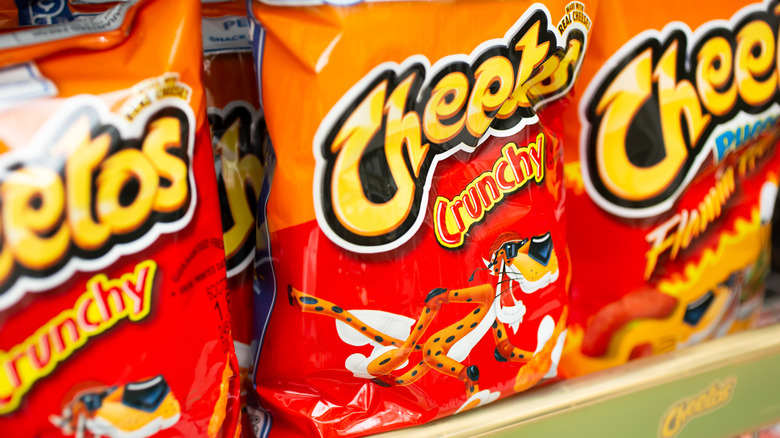 Bags of Cheetos Crunchy with the Chester Cheetah mascot