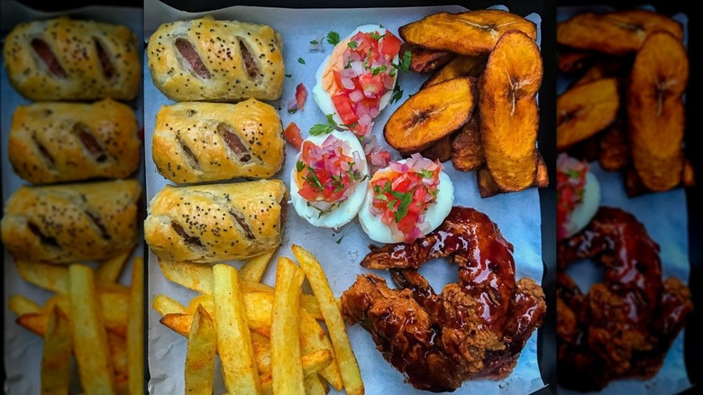 mayai pasua, fried plantains, sausage rolls, fries, and sticky wings