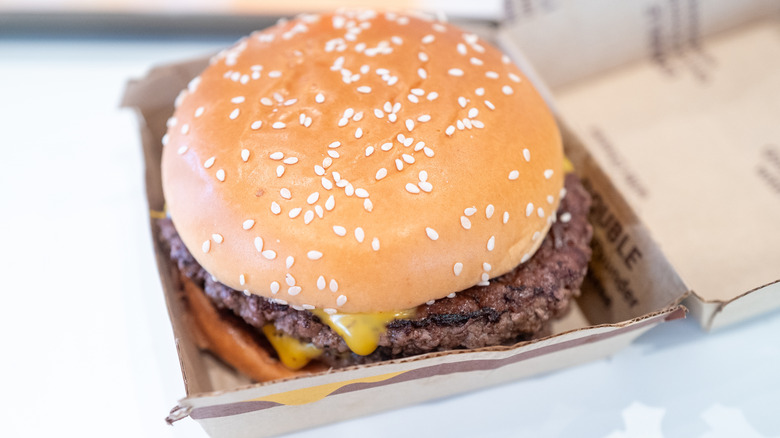 A McDonald's burger sits in its packaging