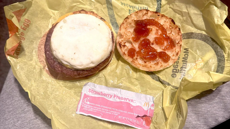 A Sausage McMuffin with strawberry jam