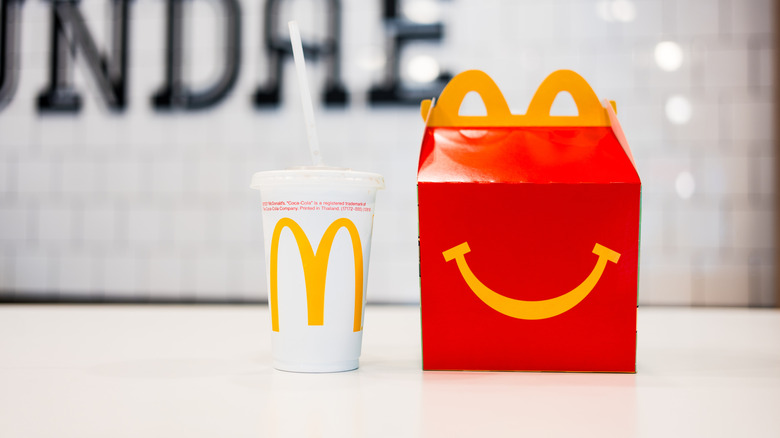 A Happy Meal box and drink.