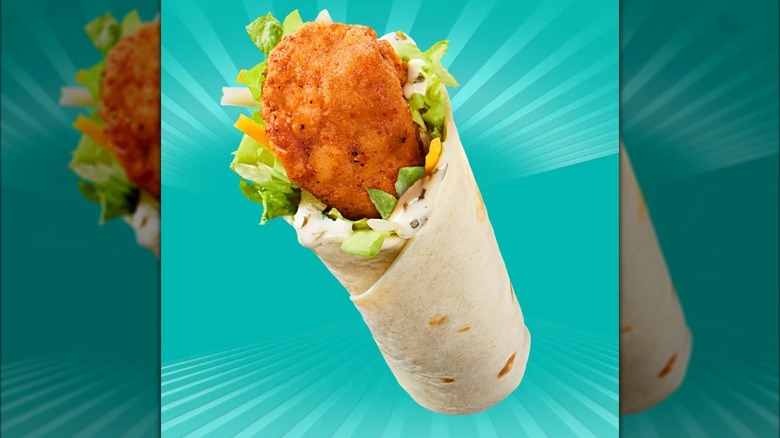 McDonald's new Snack Wrap levitates against a blue-green background