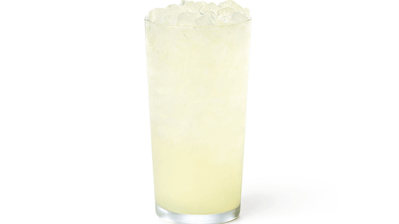 A glass of a Chick-fil-A lemonade against a white background